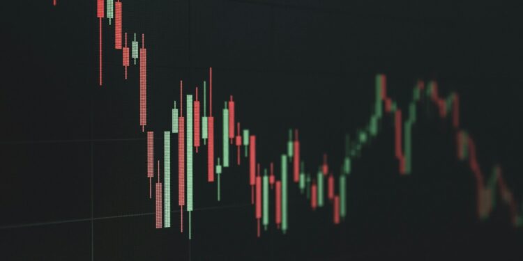 Koyu arka planda yeşil ve kırmızı renkli borsa mum grafik göstergesi.